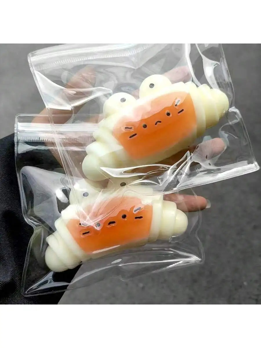 Butter Bliss: Caramel Croissant Squishy Toy