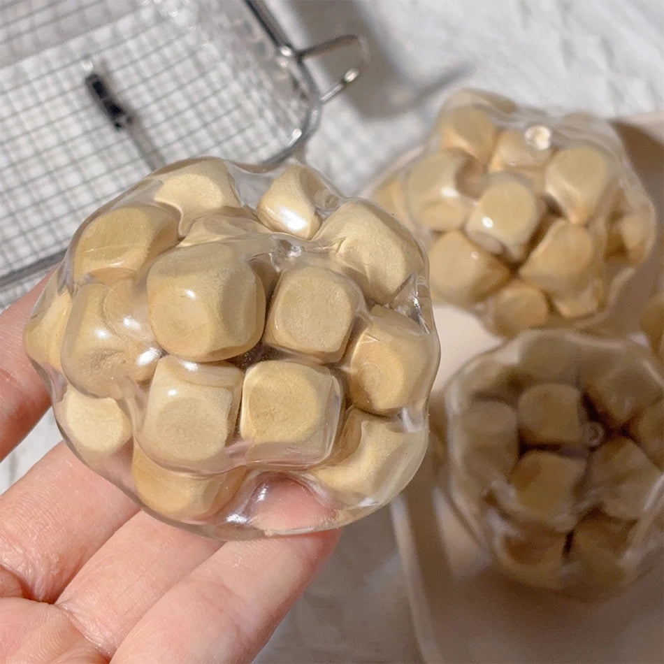 Soothe & Play: Handmade Wooden Noisy Ball Toy