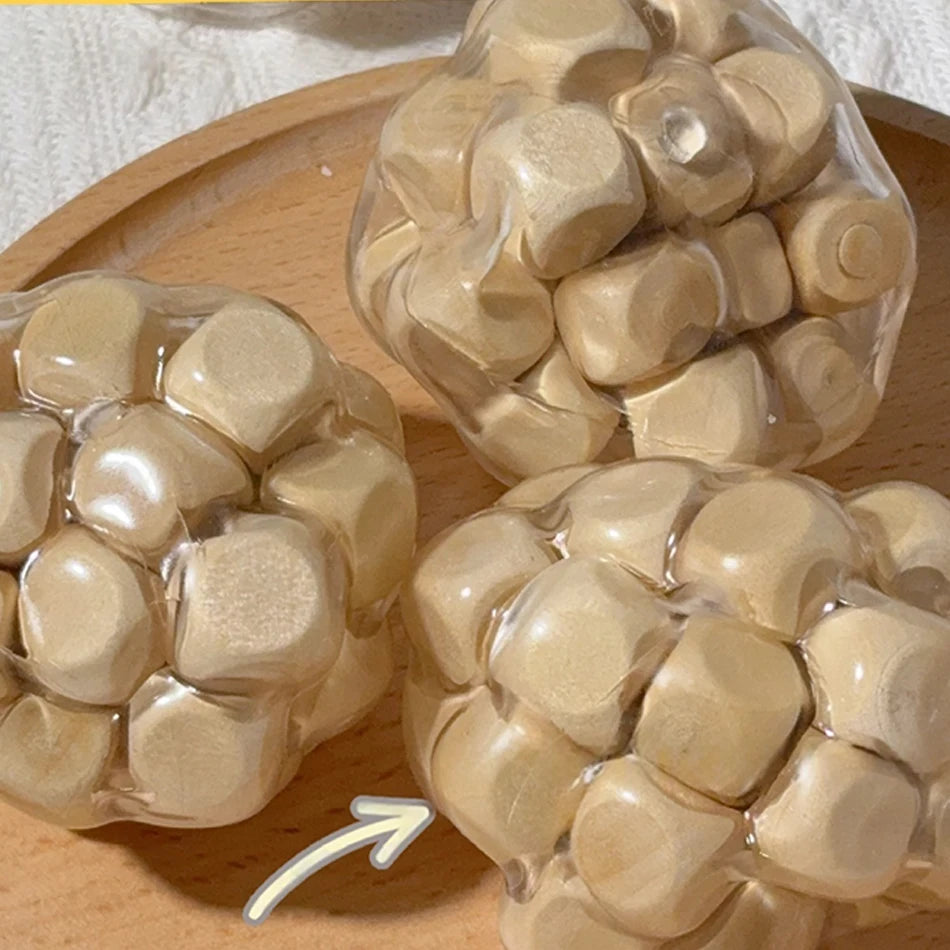 Soothe & Play: Handmade Wooden Noisy Ball Toy